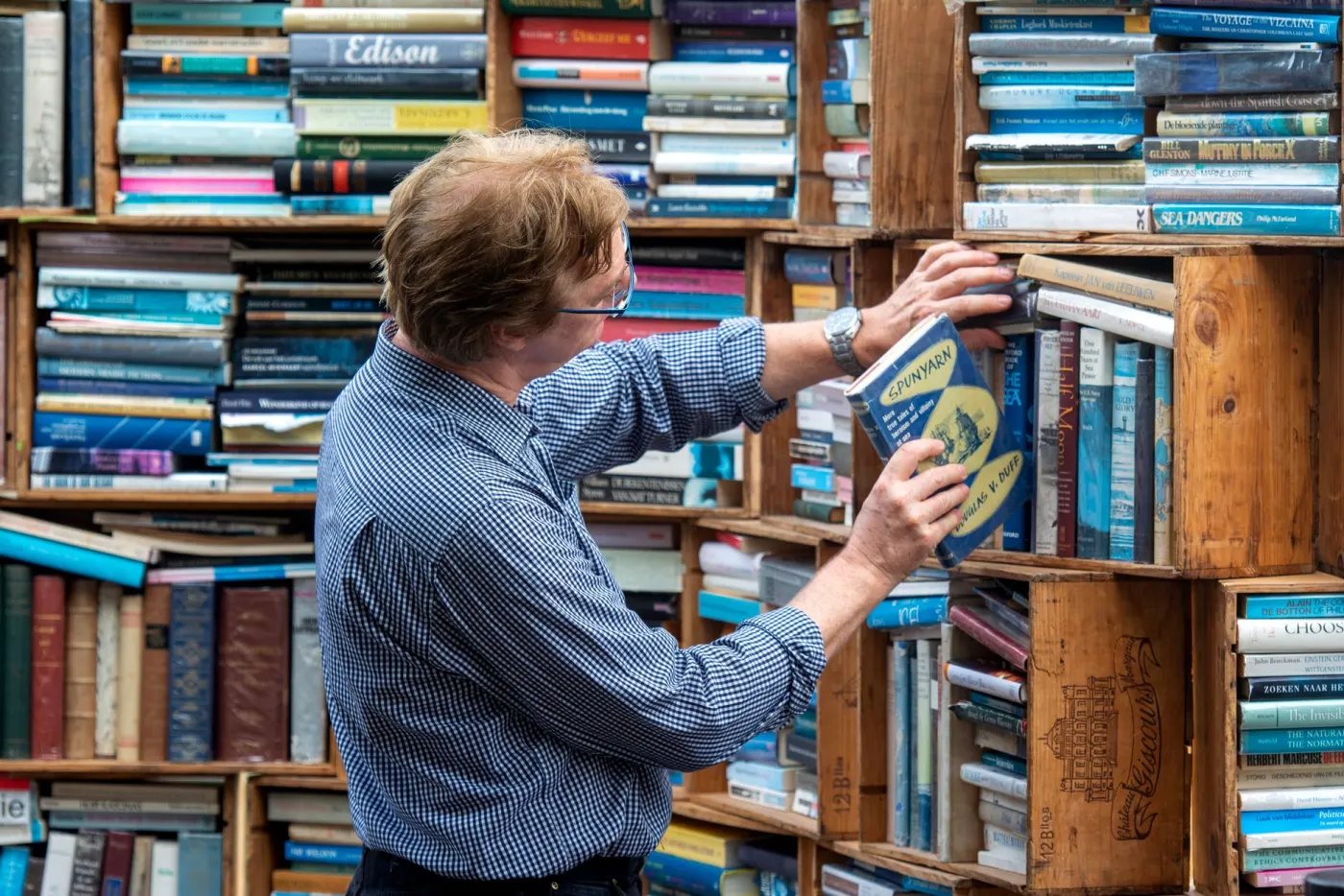 A bookseller among the shelves